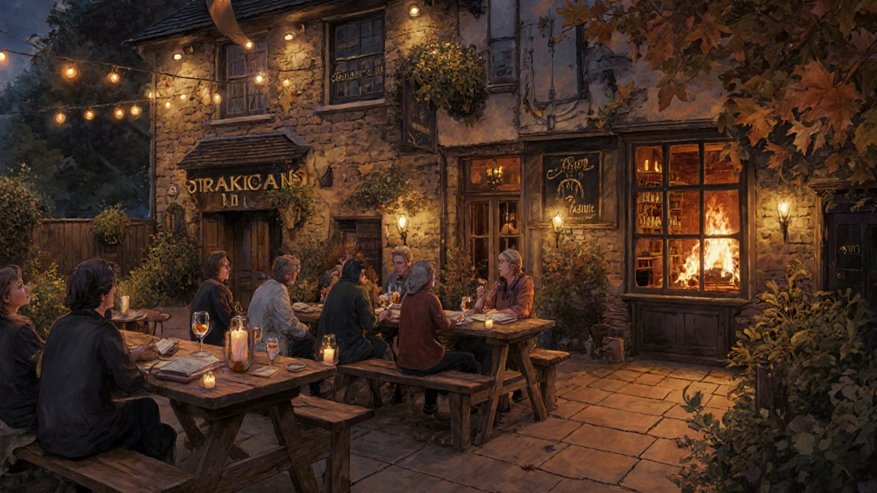 Historic Spaniard’s Inn garden terrace at night, guests relaxing by fireplace with wine and books.