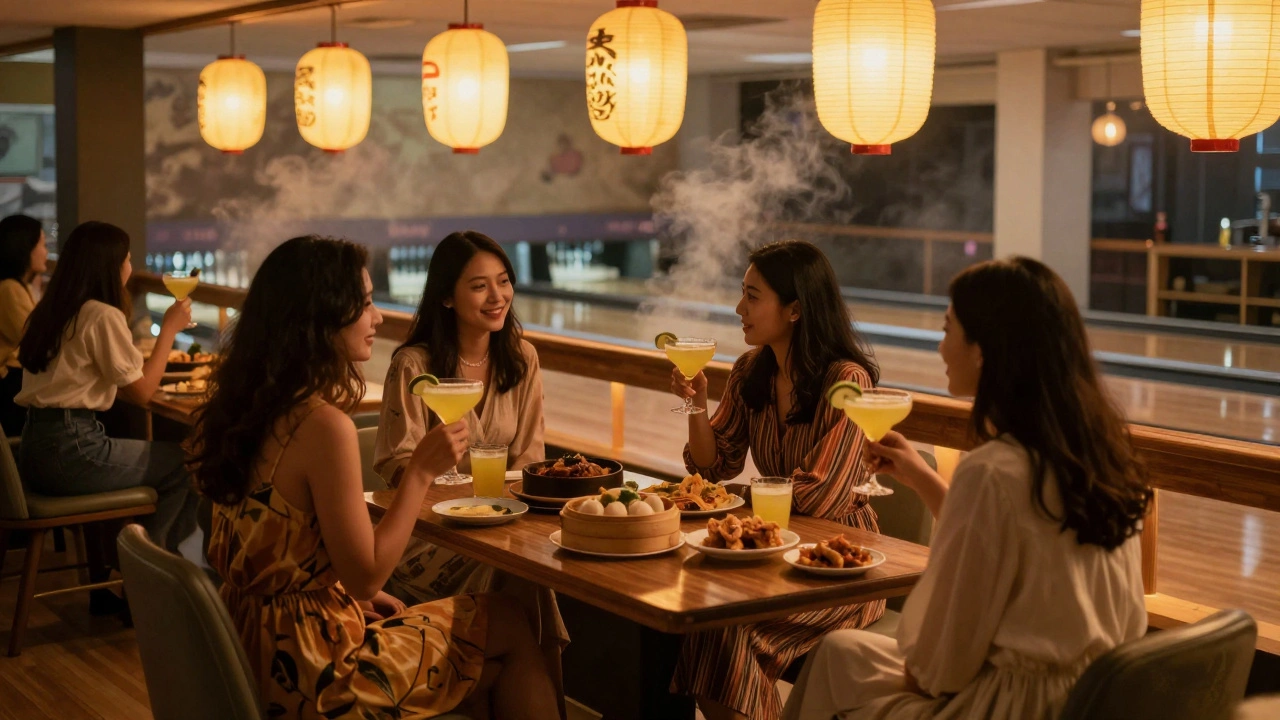 Women enjoying Asian-inspired drinks and snacks in a serene, lantern-lit bowling venue with wooden accents.