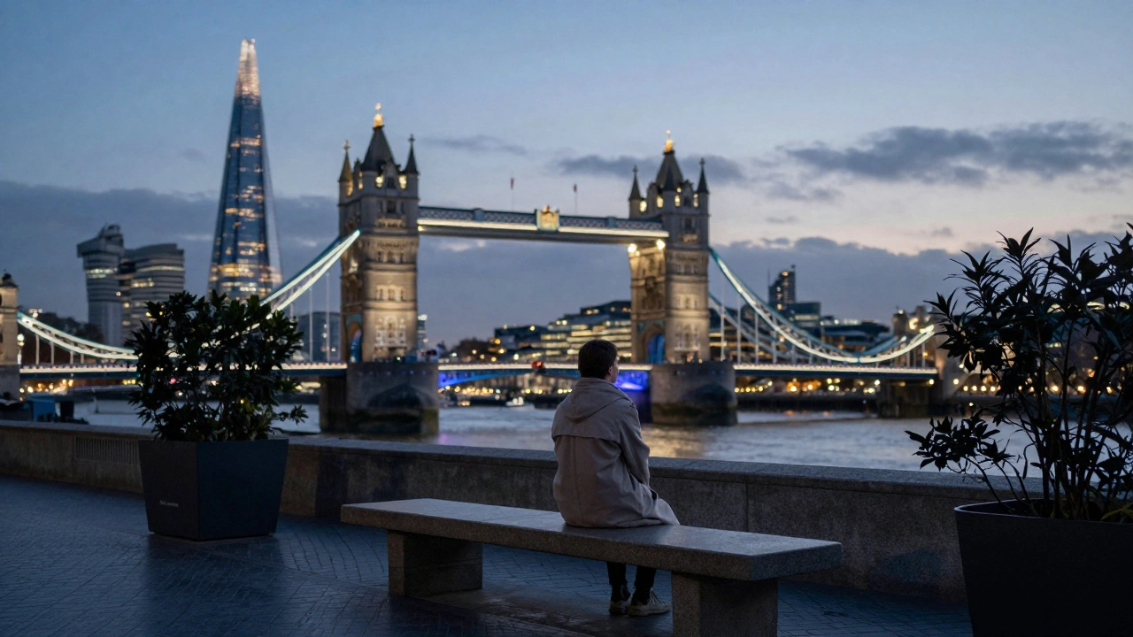 A solitary person overlooking London's skyline from a quiet rooftop garden at dusk.
