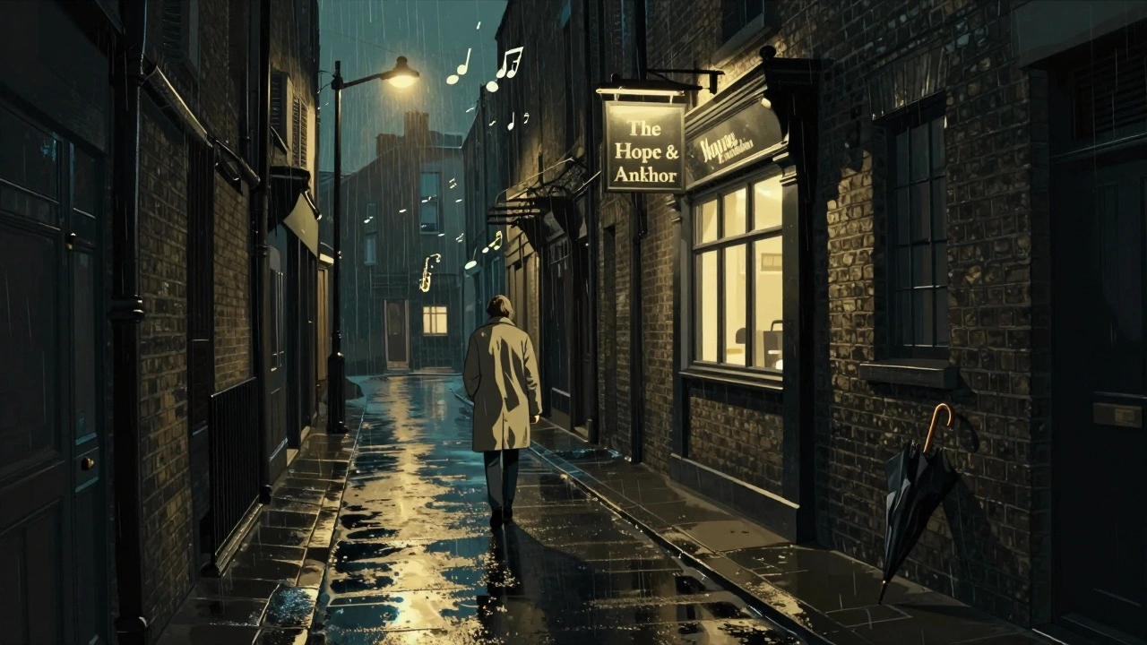 A solitary walker heads toward a pub in Camden at night, with rain-slicked streets and warm glow from a sign.