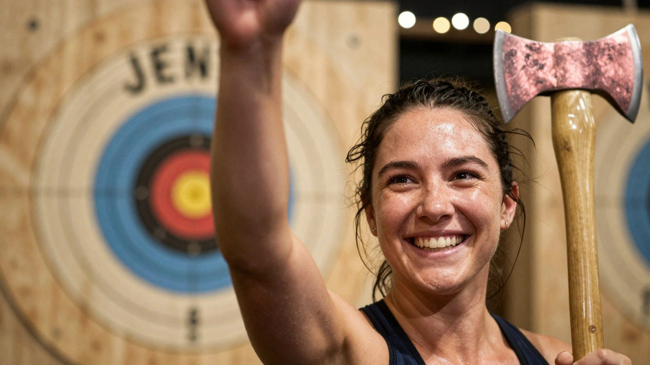 A woman smiling triumphantly after hitting a bullseye, wood dust on her arms, with a personalized target and rose-gold axe beside her.