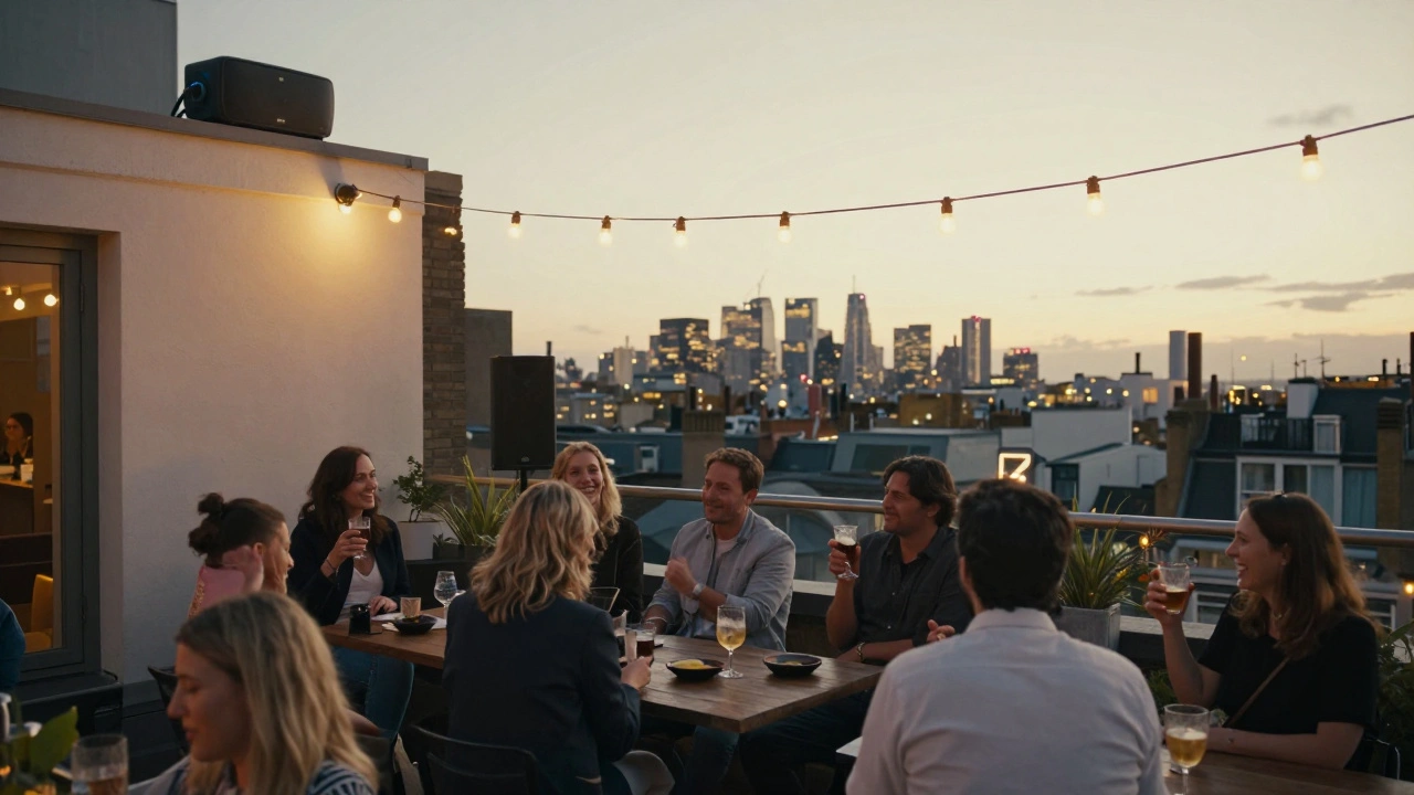 A rooftop gathering in London with guests enjoying drinks under string lights, neighbors smiling from below.